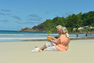 couple resting  at tropical beach