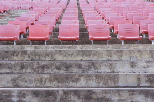 Red tiered seats of theater