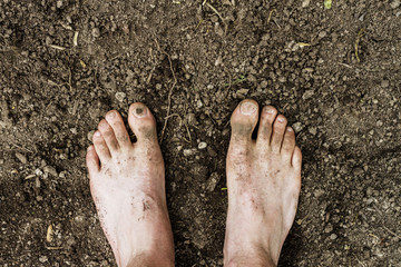 Dirty Barefoot in Soil