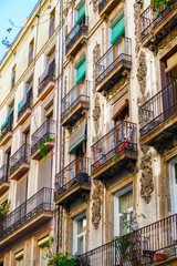 Barcelona, Spain - April 19, 2016: Medieval buildings in the Gothic Born district