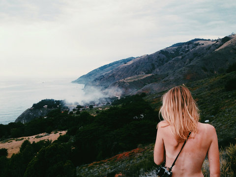 Topless woman enjoying the outdoors