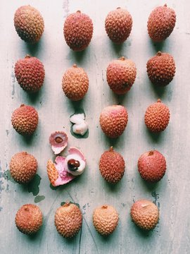 Lychee on wooden background -