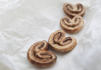 Puff pastry with cinnamon and sugar in the form of heart