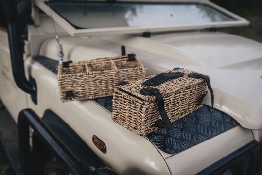 Two woven baskets on safari car for sundowner