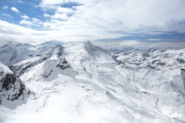 Winter view from the top of Kitzsteinhorn mountain, Kaprun ski resort, National Park Hohe Tauern, Austrian Alps, Europe.