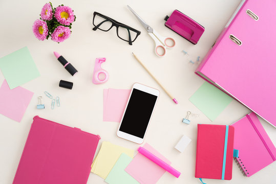 Collection of feminine desktop office objects