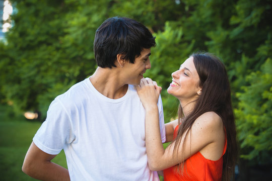 portrait of happy Hispanic couple in the park