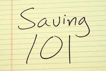 The words "Saving 101" on a yellow legal pad