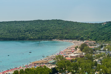 View of a modern beach in the region of Budva, Montenegro, Europe. Budva is one of the best and most popular resorts of the Adriatic Riviera.