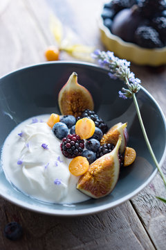 Breakfast. Yogurt with fruits.