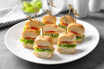 Mini sandwiches for baby shower on plate - obrazy, fototapety, plakaty