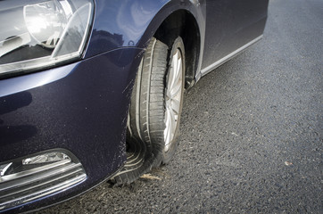 damaged tire after tire explosion at high speed on highway - obrazy, fototapety, plakaty