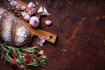 Bakery background, baking ingredients over rustic kitchen countertop.