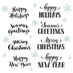 Hand written New Year phrases. Greeting card text  with snowflakes isolated on white background. Happy holidays lettering in modern calligraphy style. Merry Christmas and Seasons Greetings lettering.
