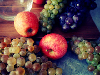 Sweet apples and grapes background vintage style