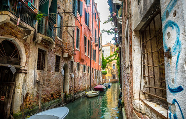 Fototapeta na wymiar Canal in a summer day in Venice, Italy