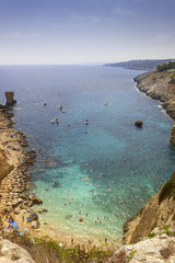 Summer seascape, Apulia coast: Salento beach: Miggiano bay. It's characterized by a alternation of sandy coves and jagged cliffs overlooking a truly clear and crystalline sea.