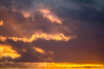 Fiery orange sunset sky