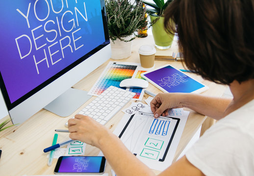 Web Designer with 3 Devices Mockup 1
