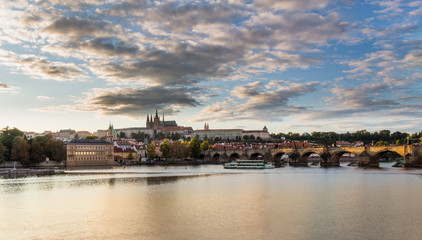 Fototapeta na wymiar Charles Bridge and Prague Castle evening panorama