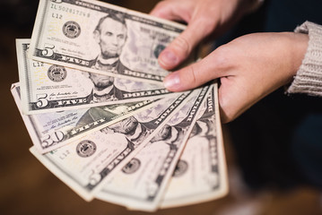 Dollar bills, money background. Dollars money set close up in hand