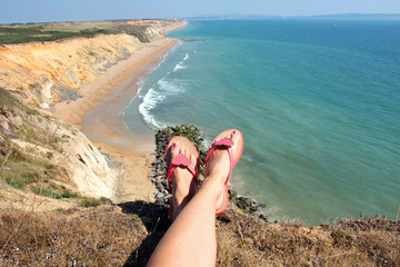 Legs selfie on the cliff