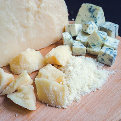 Grated Parmesan and sliced Blue cheese