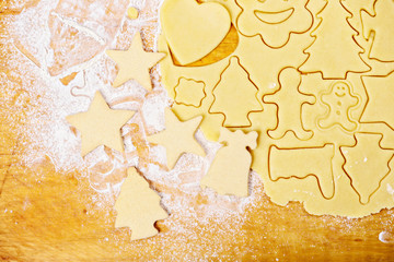 cutting out cookies from dough