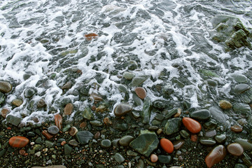 Colorful rocks in the surf
