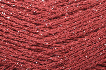 A super close up image of red yarn 