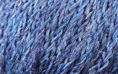 A super close up image of sea blue yarn
