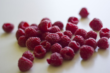 Fresh raspberry on white background