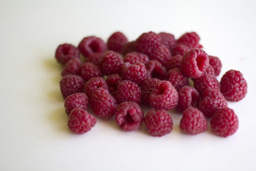 Fresh raspberry on white background