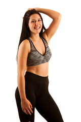 Fototapeta premium Active young woman - portrait of a sporty young girl isolated over white background