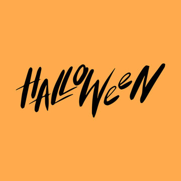 Black Lettering Halloween On Orange Background