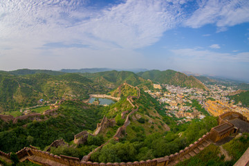 Beautiful view of the Amber fort in Rajasthan in Jaipur India with a stoned walls protecting the ancient indian palace, fish eye effect