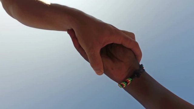Equality handshake of two multicultural race people