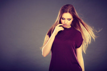 Attractive brunette woman with windblown hair