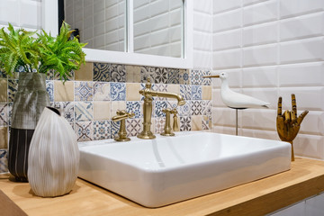 Interior of bathroom with sink basin faucet and mirror. Modern design of bathroom