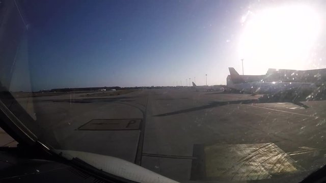 time lapse.run down the runway of a commercial airplane and parking in finger. mallorca.cabin view