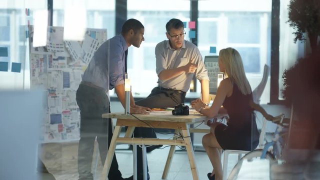 Creative Design Team In A Meeting In Modern Glass Office. May Depict Third Party?