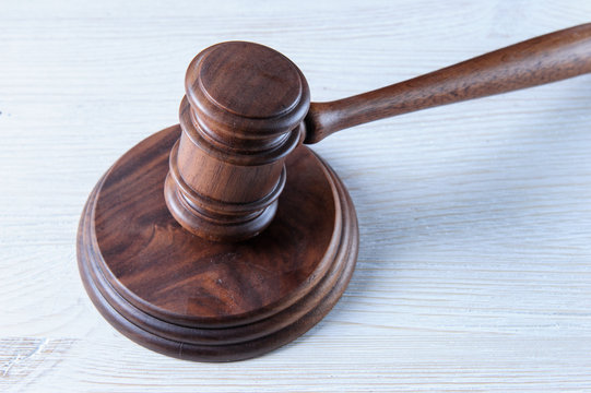 Wooden mallet on a white background