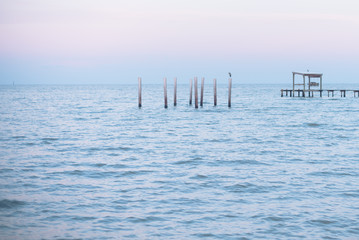 Sunset from pier over ocean