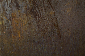 The wall is covered with tin.