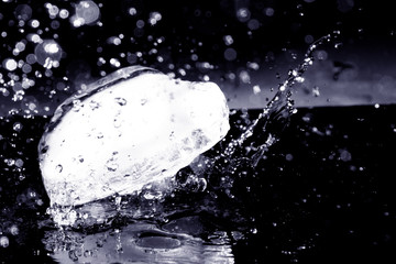 Ice Block / Ice is water frozen into a solid state. Depending on the presence of impurities. it can appear transparent or a more or less opaque bluish-white color.