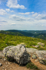 Fototapeta premium big boulder on top of parc des grands-jardins