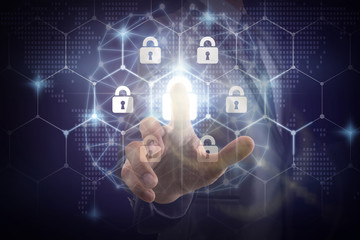 Double exposure of Businessman Hand touching the Security key lock icon digital display over the world map and Hexagon shape on the Artificial intelligence of brain technology with blue background