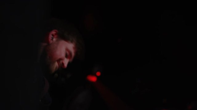  Band performing live on stage at with musician playing the mandolin