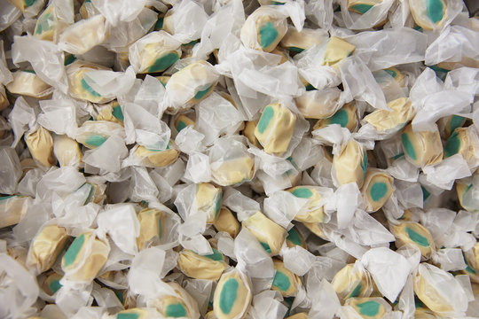background of salt water taffy. mint chocolate candies