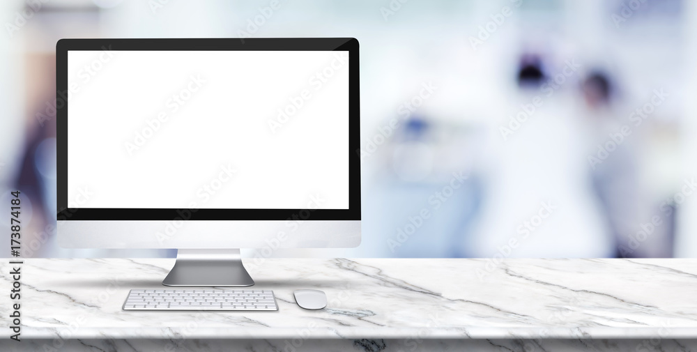 Poster blank screen of desktop computer on white marble table with blur patient waiting for doctor at hospi